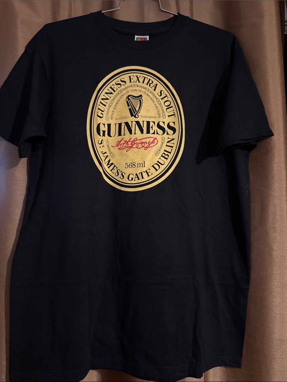 Vintage Y2K Guinness Black T‑Shirt with Gold Oval Label